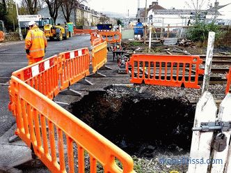 Construction fences for a building site: an example with a photo