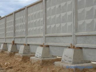 Construction fences for a building site: an example with a photo