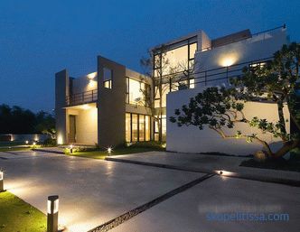 Design of a modern two-story house with a flat roof