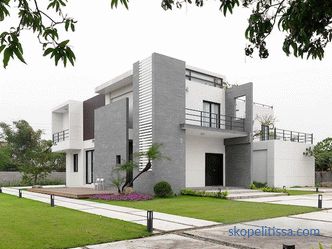 Design of a modern two-story house with a flat roof