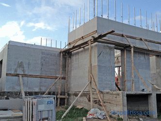 Construction of country houses from reinforced concrete panels - what kind of technology