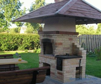 Brick grill, foundation for a barbecue oven and a brick grill, stages of construction, photo