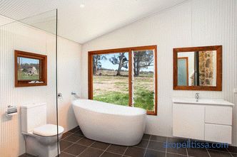Design of a bathroom in a private house with a window, projects in country houses, modern ideas, photos